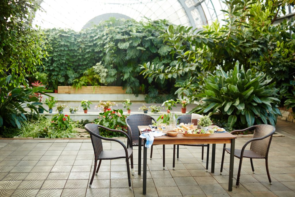 A modern interlocking patio with large geometric concrete slabs