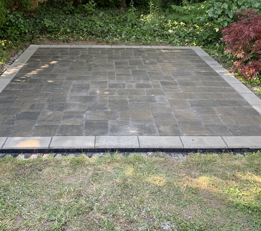 stone patio backyard
