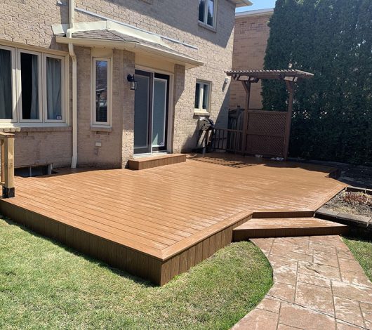 wooden stairs and deck on the backyard